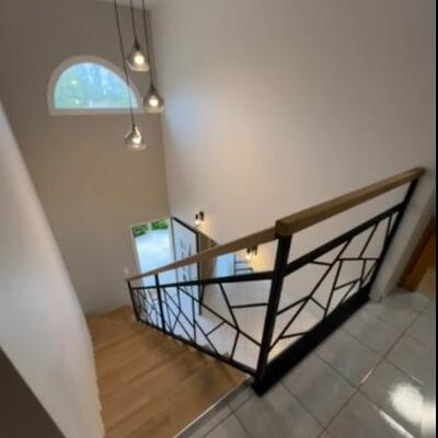 Conception d'une main courante unique en fer forgé.