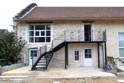 La demande : Création d'un petit appartement fonctionnel au dessus d'une cave voutée